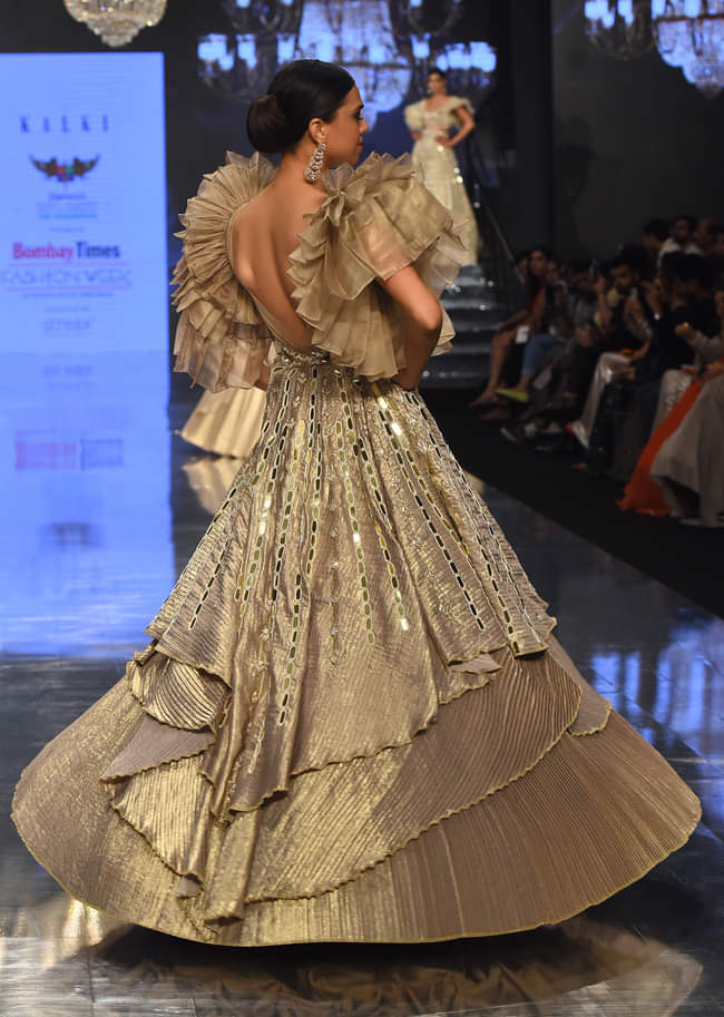Gold Toned Kalki Gown With Ruffle Sleeves And Embroidery - NOOR 2022