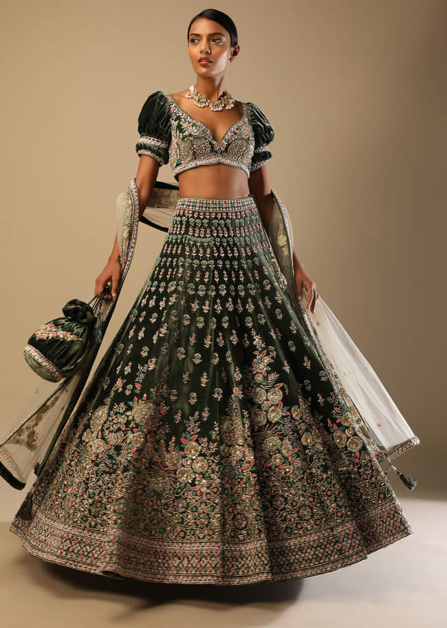 Palace Green Lehenga Choli In Velvet With Short Puff Sleeves And Multi Colored Hand Embroidery In Floral And Geometric Motifs 