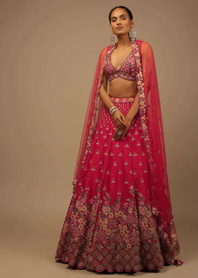 Rani Pink Lehenga Choli In Raw Silk With A Cluster Of Multi Colored Resham Flowers And Cut Dana Highlights