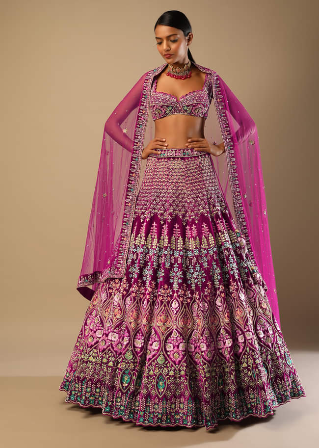 Sangria Lehenga Choli In Velvet With Colorful Resham And Sequin Flowers And Golden Cut Dana Adorned Moroccan Motifs 