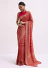 Green Khaddi Georgette Bandhani Saree With Zari Jaal Motif Weave