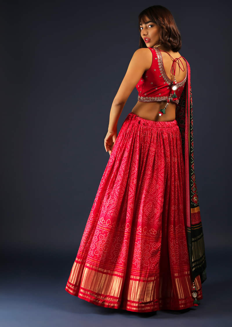 Apple Red Lehenga In Bandhani Printed Satin With Zardosi Embroidered Choli And Patola Dupatta 