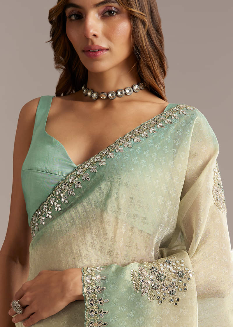 Aqua Blue Jacquard Saree With Mirror And Bead Embroidery