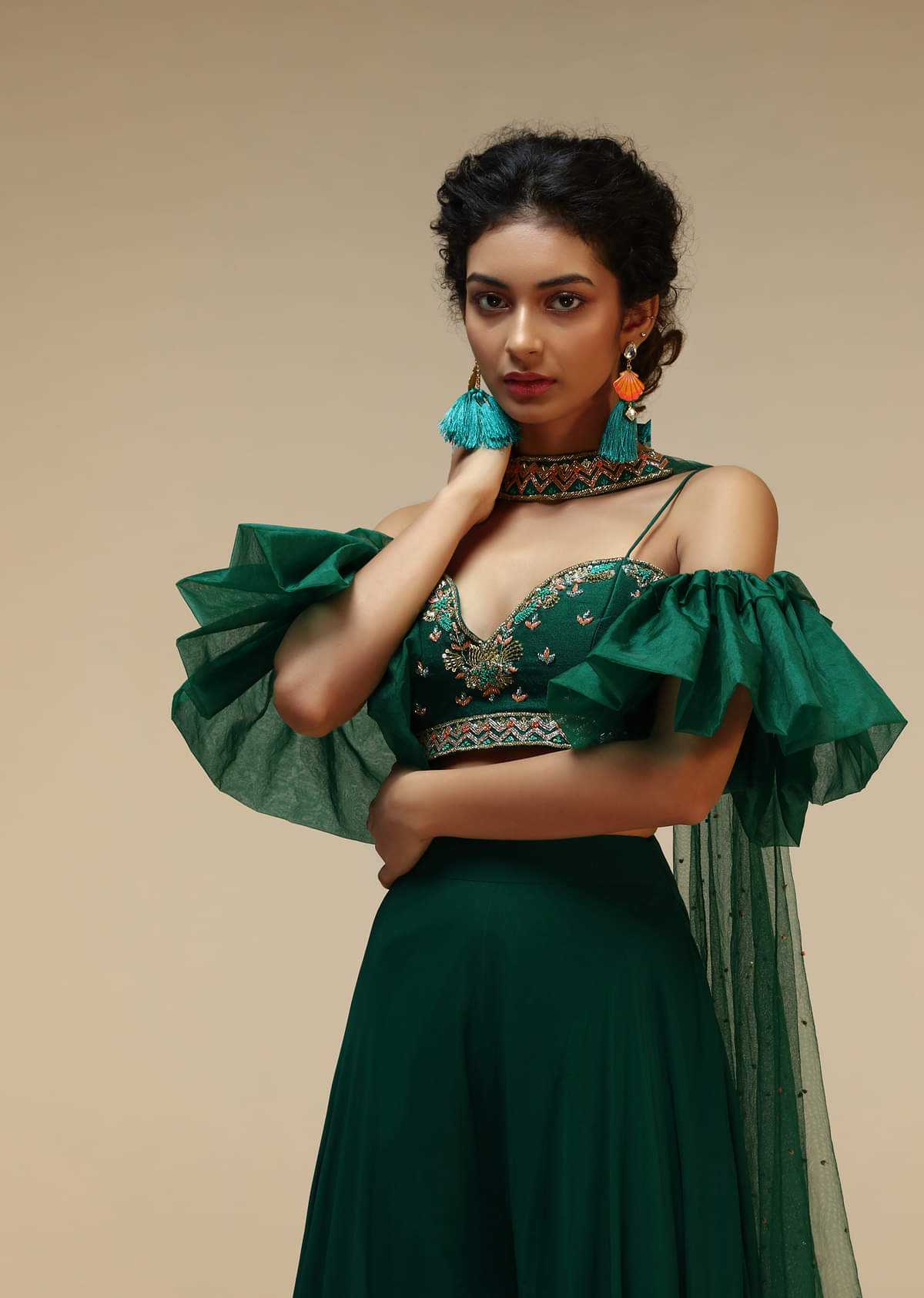 Bottle Green Palazzo Suit With A Cold Shoulder Crop Top Featuring Short Bell Sleeves And Multi Colored Hand Embroidery  