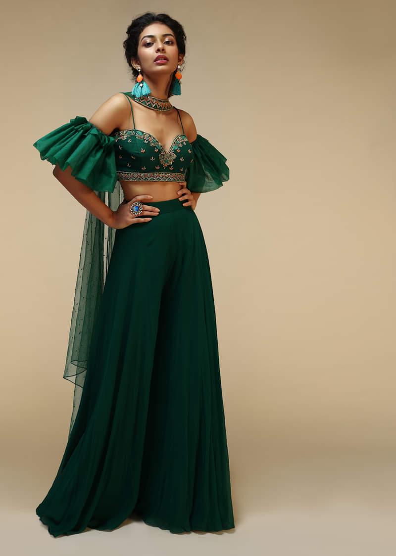 Bottle Green Palazzo Suit With A Cold Shoulder Crop Top Featuring Short Bell Sleeves And Multi Colored Hand Embroidery  