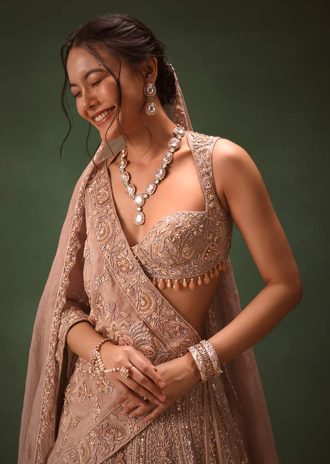 Bronze Self Embroidered Lehenga Set With Two Dupattas