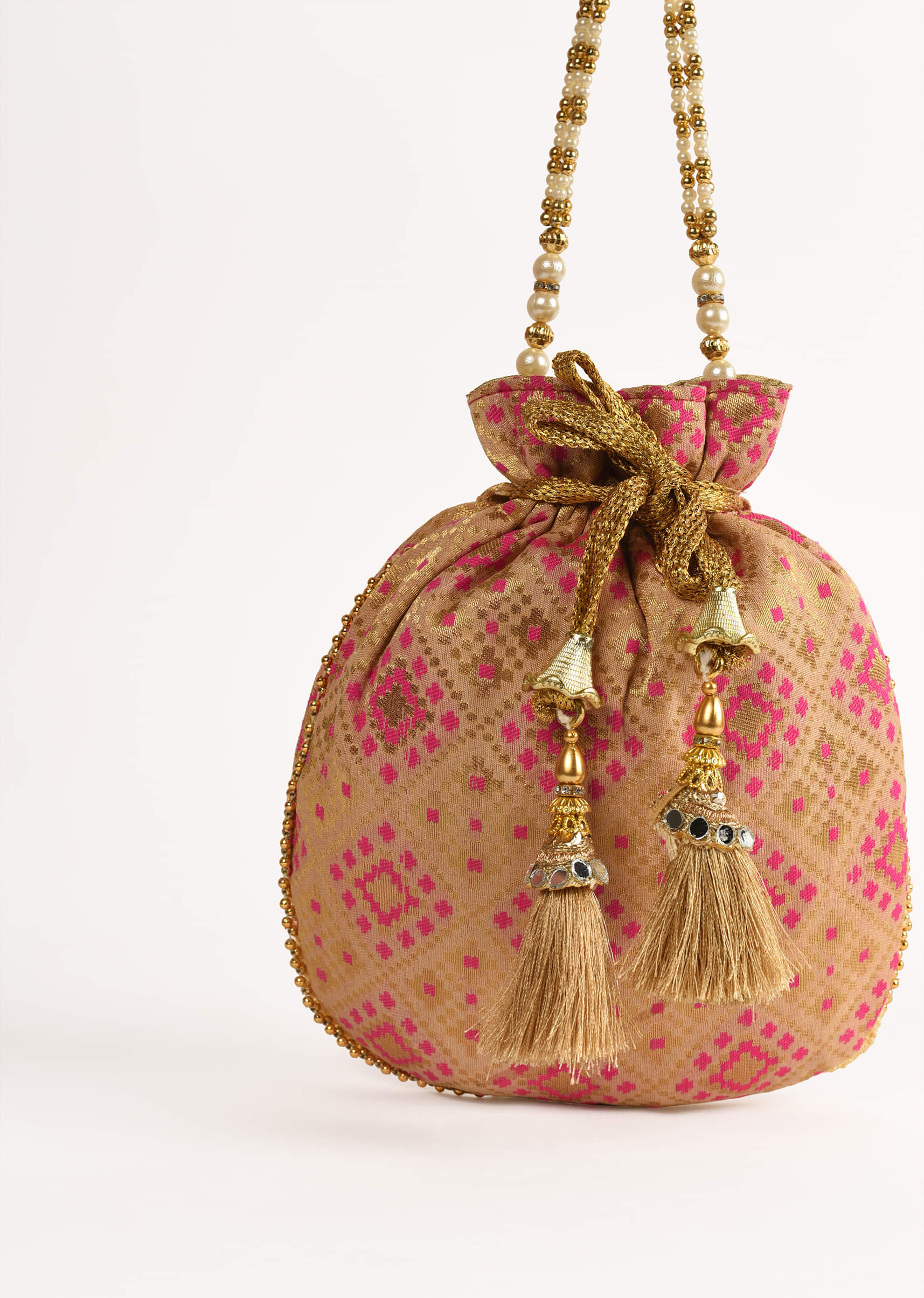 Buy Gold Beige Potli Bag In Brocade Silk With Pink Geometric Jaal Design Online Kalki Fashion