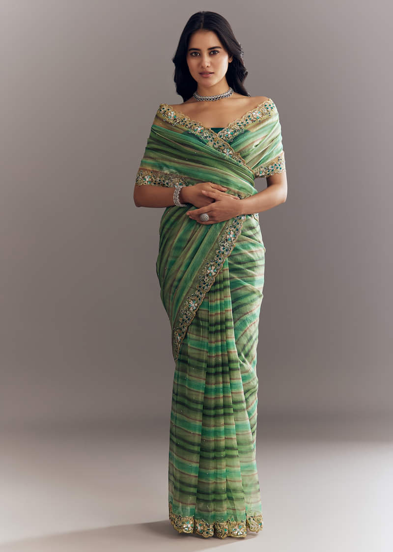 green-shaded-tissue-saree-with-cutdana-sequins-and-beads-embroidery-and-scallop-border-sg292890-1.jpg?w=800