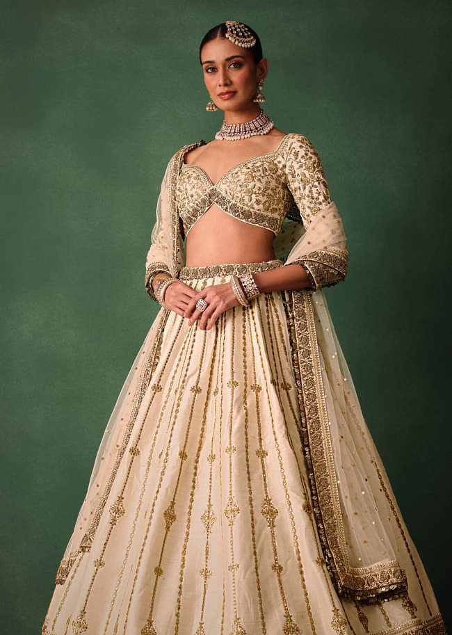 Ivory Raw Silk Hand Embroidered Lehenga Set With Net Dupatta
