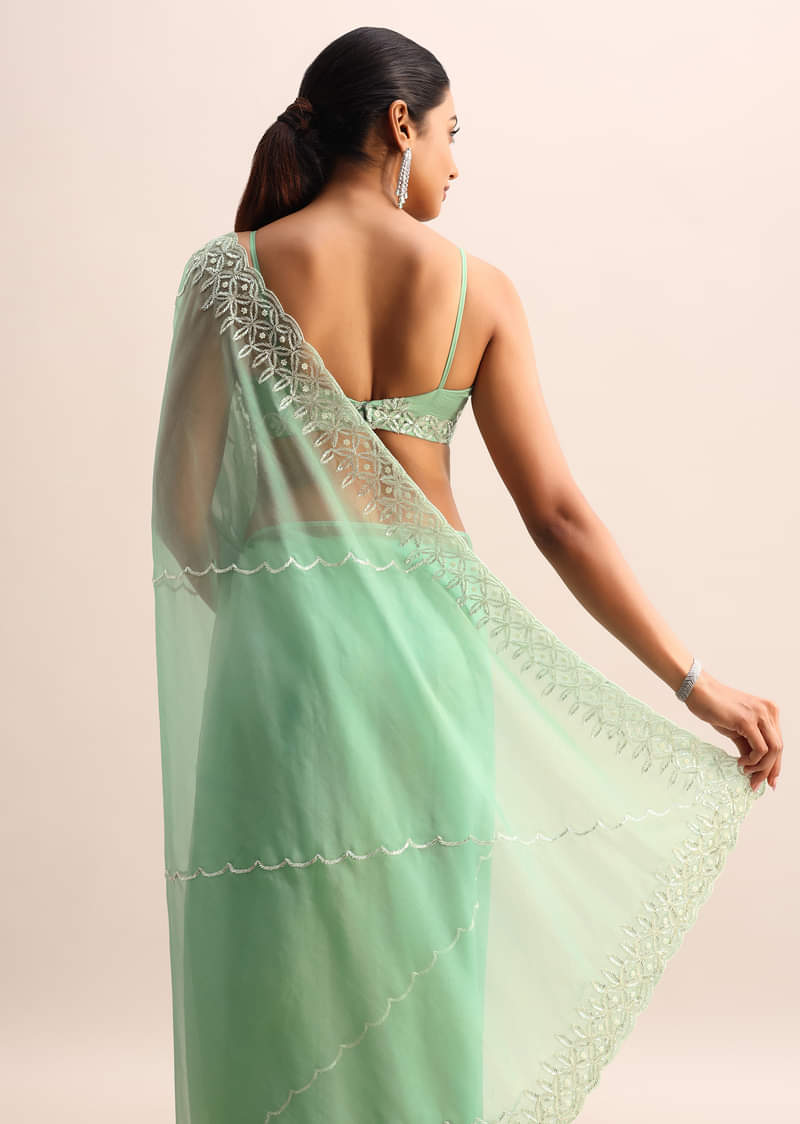 Mint Blue Organza Saree With Cutdana Embroidery And Scallop Border With Unstitched Blouse