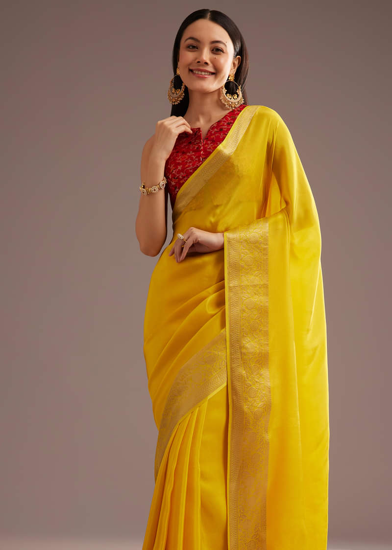 Mustard Yellow Crepe Silk Saree With Zari Border And Contrast Blouse