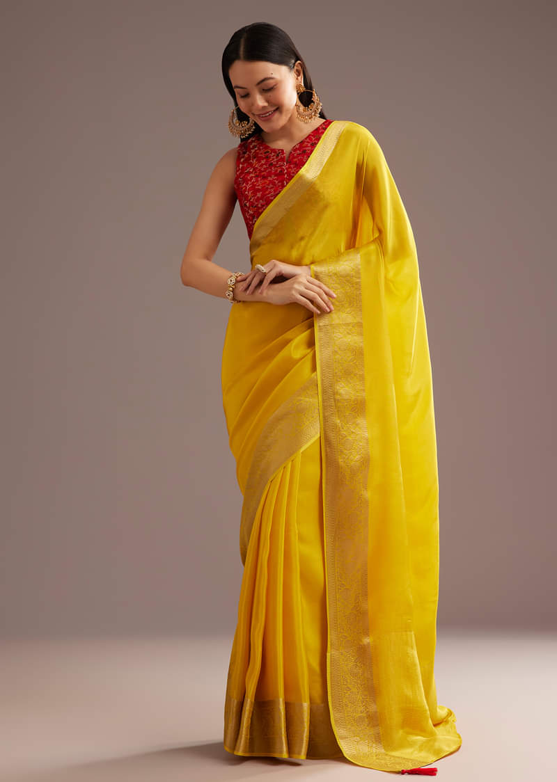 Mustard Yellow Crepe Silk Saree With Zari Border And Contrast Blouse