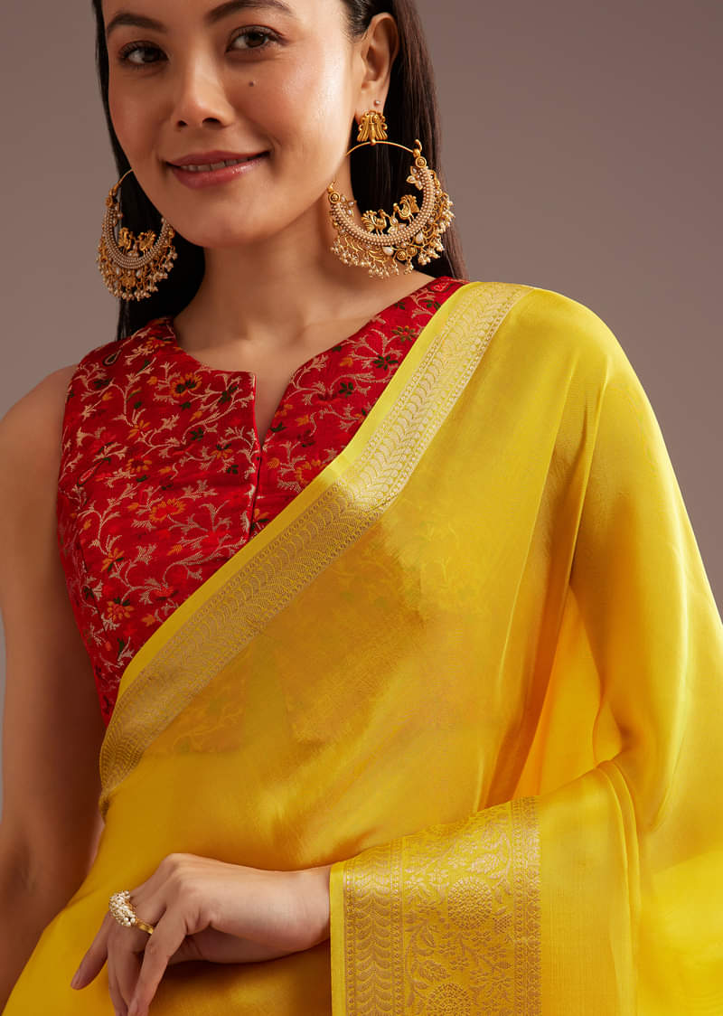 Mustard Yellow Crepe Silk Saree With Zari Border And Contrast Blouse