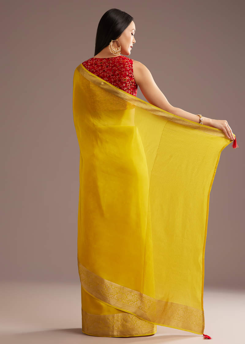 Mustard Yellow Crepe Silk Saree With Zari Border And Contrast Blouse