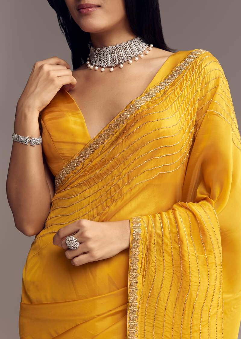 Mustard Yellow Organza Saree With Scallop Border And Stone Work