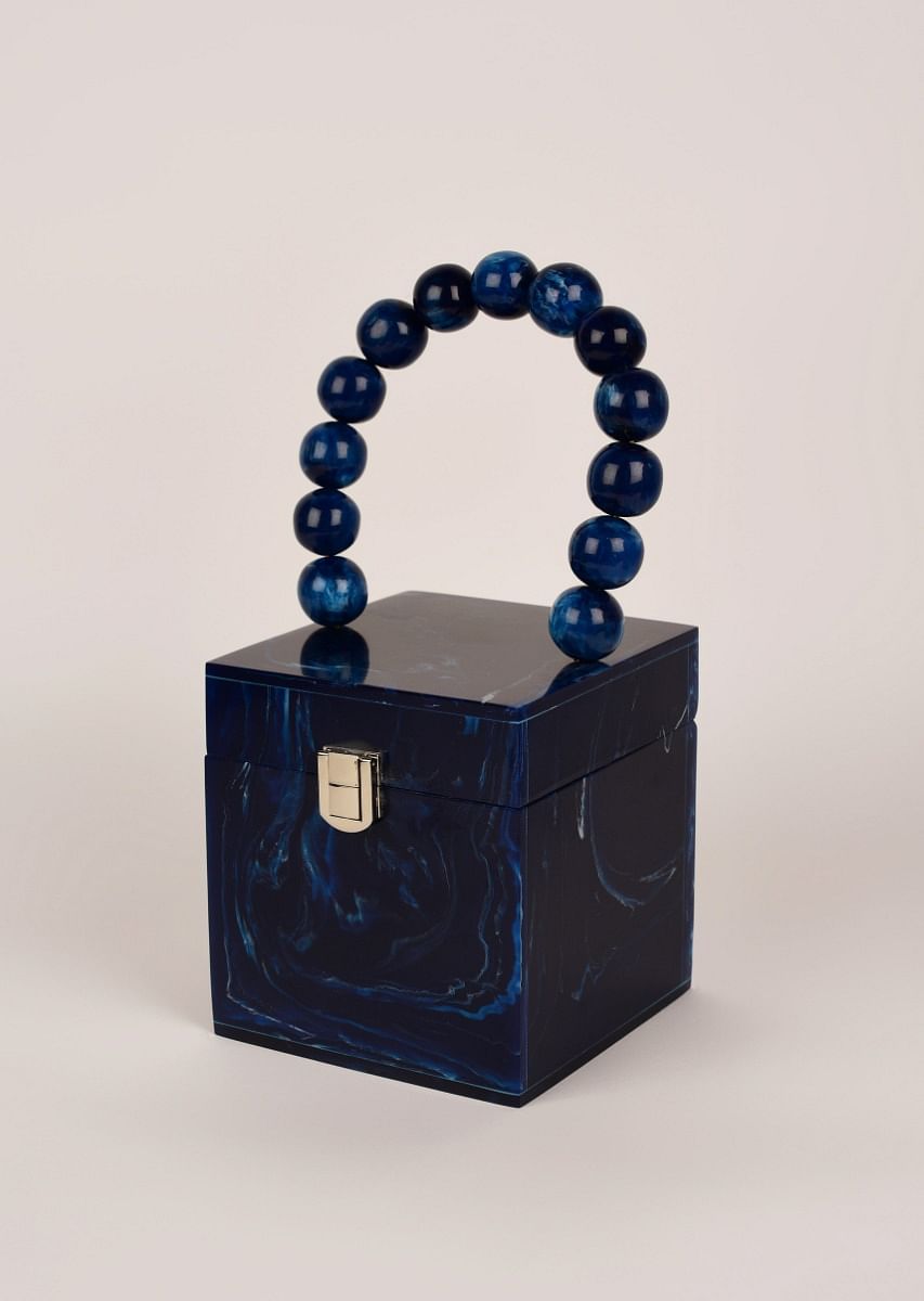 Navy box clutch bag top