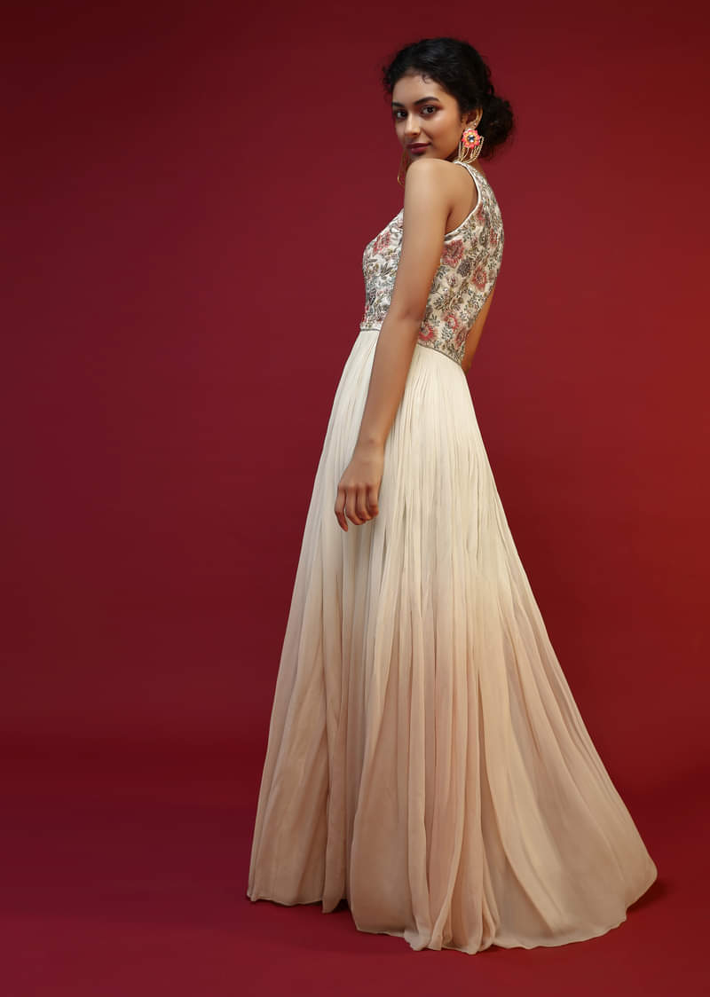 Off White Anarkali Suit With Halter Neckline And Adorned In Multicolored Hand Embroidered Floral Design On The Bodice  