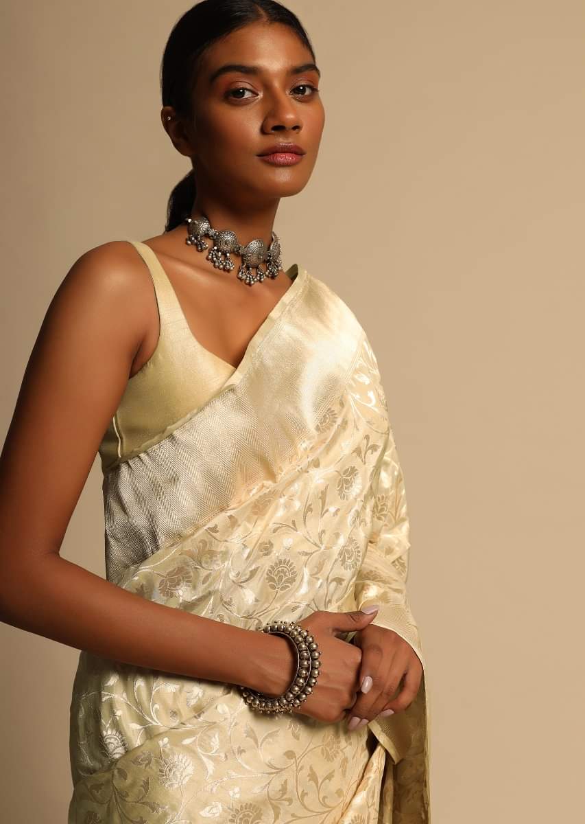 Buy Beige Banarasi Saree In Pure Handloom Silk With Woven Floral Jaal And Floral And Checks Border Along With Unstitched Blouse Piece KALKI Fashion India