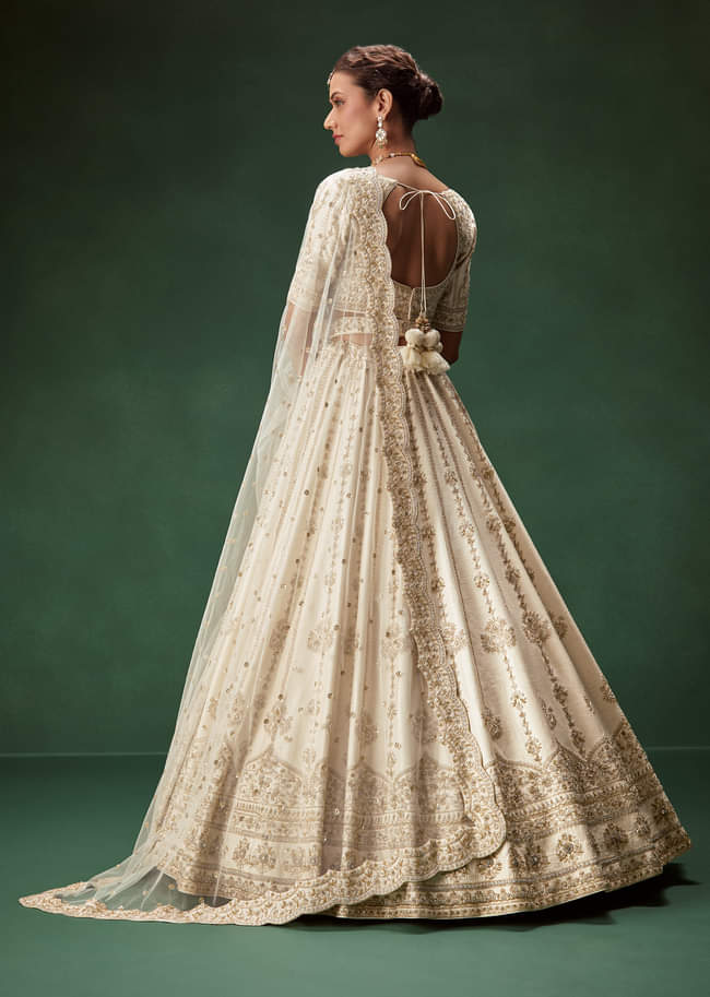 Off White Bridal Lehenga Set With Boat Neck Blouse And Regal Zari Work