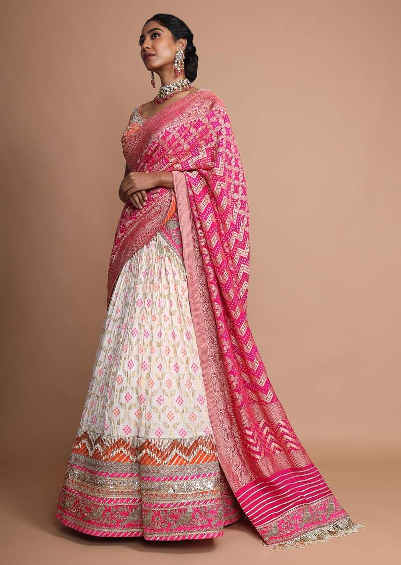 Off White Lehenga With Bandhani Print, Weaved Design And Heavy Gotta Work Border 