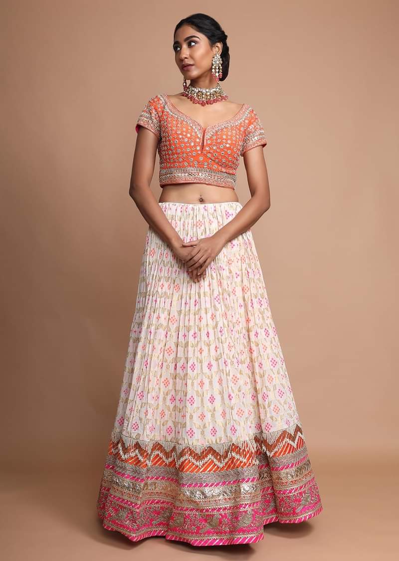 Off White Lehenga With Bandhani Print, Weaved Design And Heavy Gotta Work Border 
