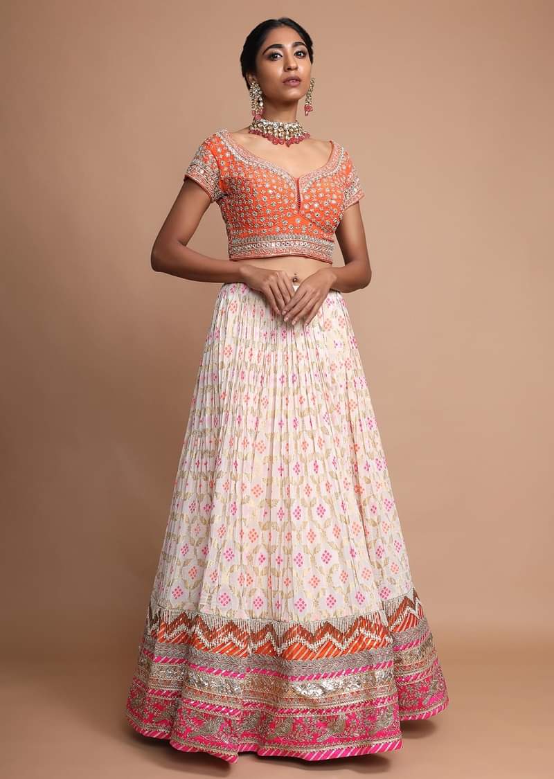 Off White Lehenga With Bandhani Print, Weaved Design And Heavy Gotta Work Border 