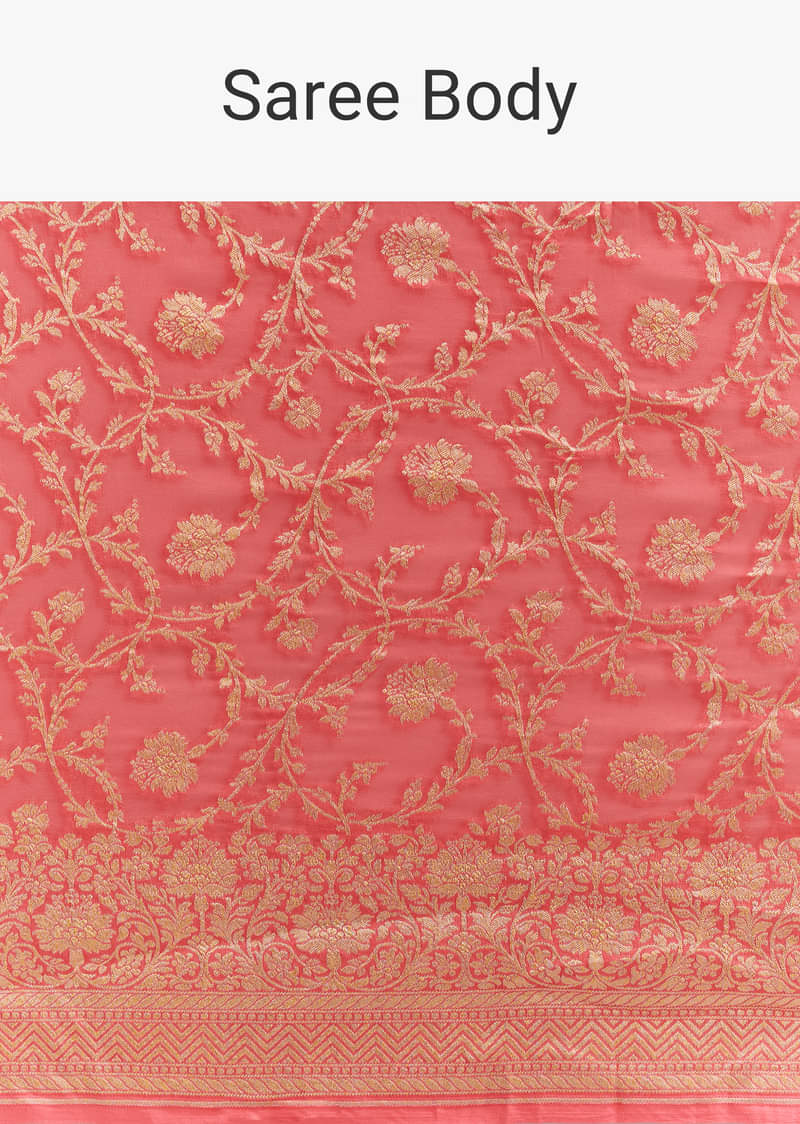 Peach Georgette Woven Saree With Floral Jaal And Heavy Border