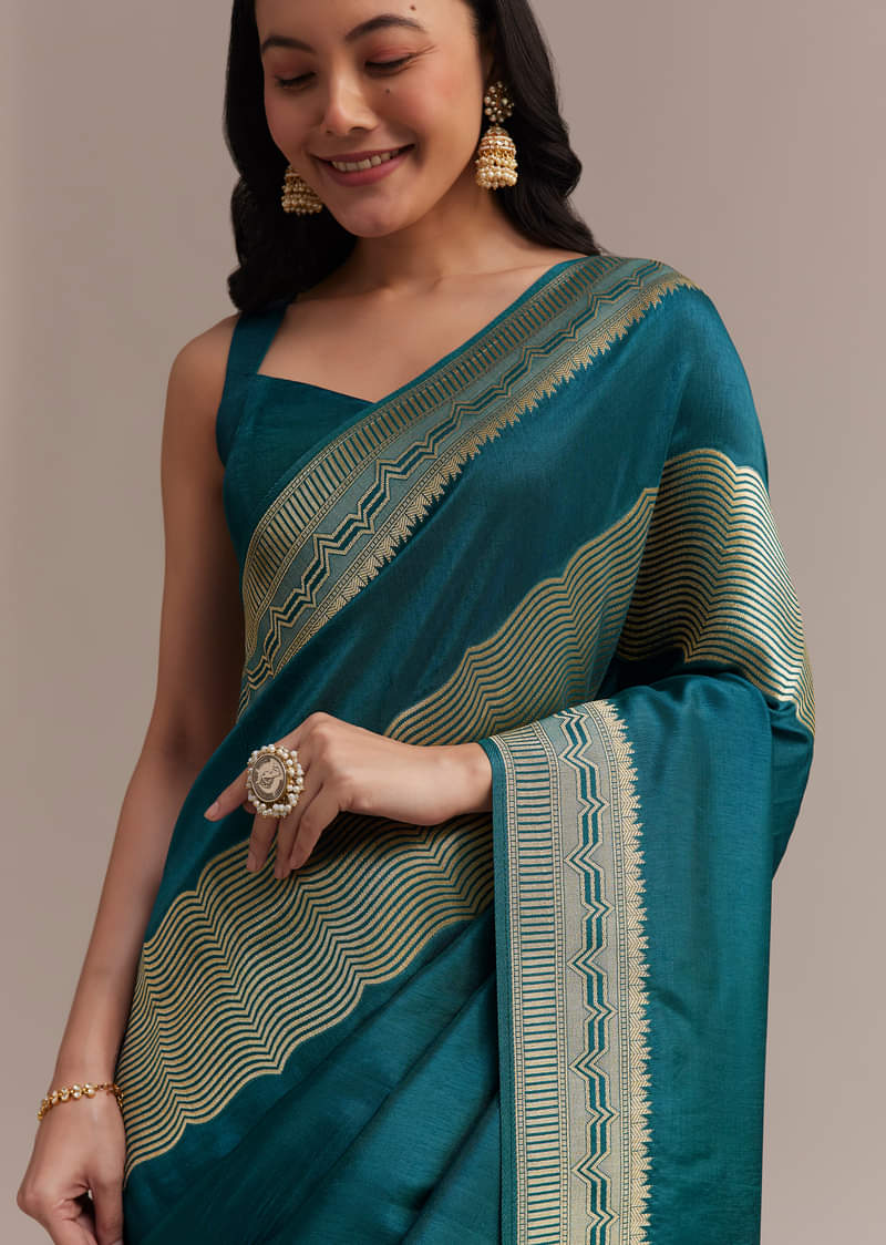 Peacock Blue Dola Silk Saree With All Over Zari Weaving