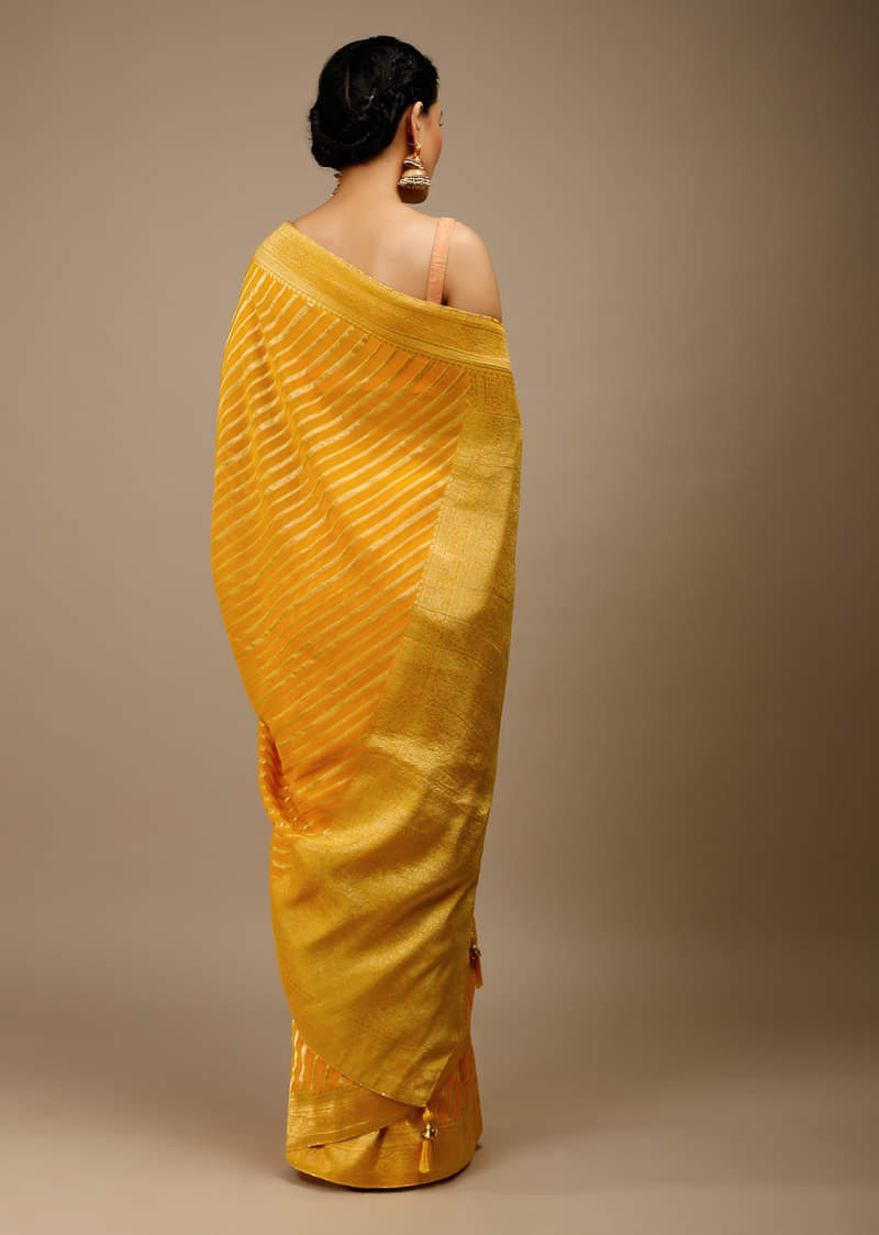 Radiant Yellow Saree In Georgette With Brocade Woven Diagonal Stripes And Floral Border  