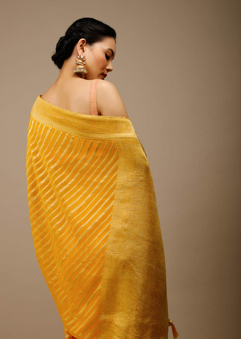 Radiant Yellow Saree In Georgette With Brocade Woven Diagonal Stripes And Floral Border  