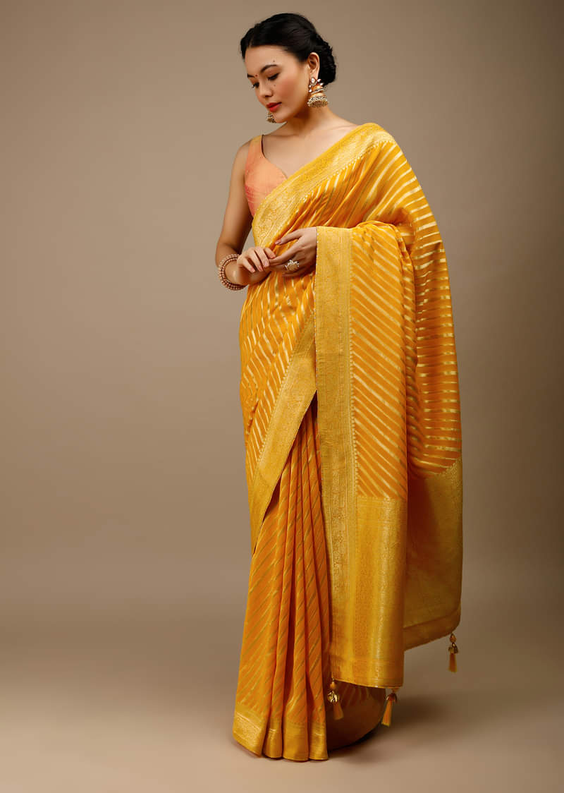 Radiant Yellow Saree In Georgette With Brocade Woven Diagonal Stripes And Floral Border  