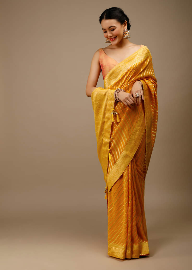 Radiant Yellow Saree In Georgette With Brocade Woven Diagonal Stripes And Floral Border  