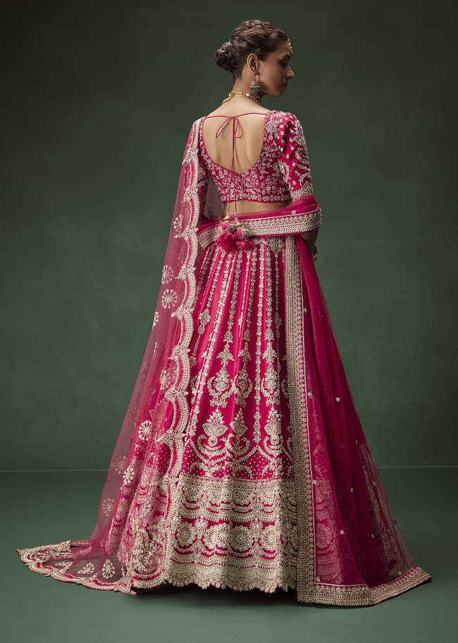 Rani Pink Bridal Lehenga With Embroidered Blouse And Heavily Worked Dupattas