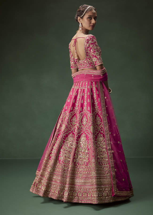 Rani Pink Bridal Lehenga With Gold Zari And Rich Embroidery