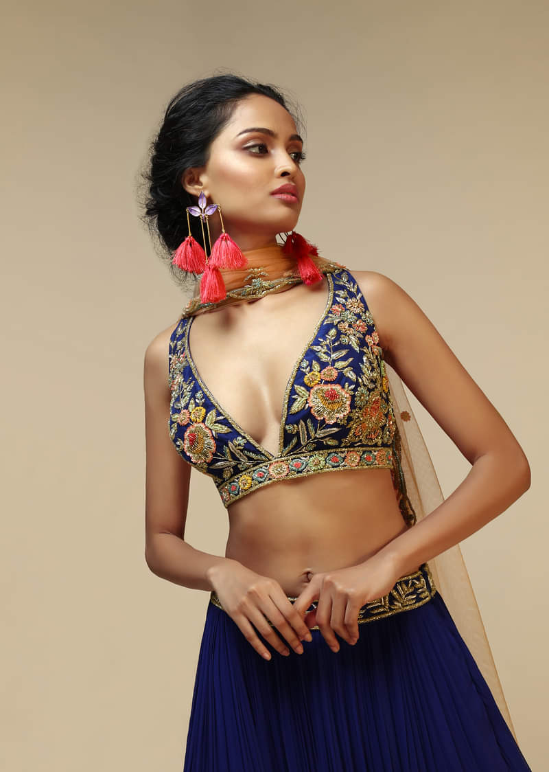 Royal Blue Lehenga Choli With Plunging Neckline And Hand Embroidered Using Multi Colored Beads And Resham 