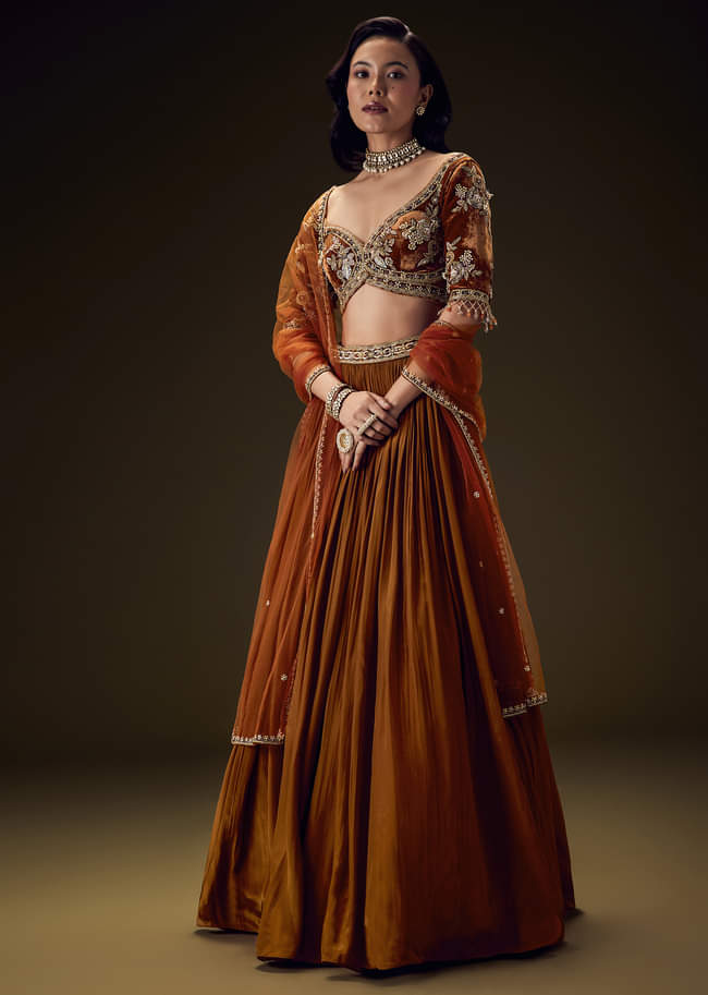Rust Orange Velvet Lehenga With Embellished Cross Body Blouse and Dupatta

