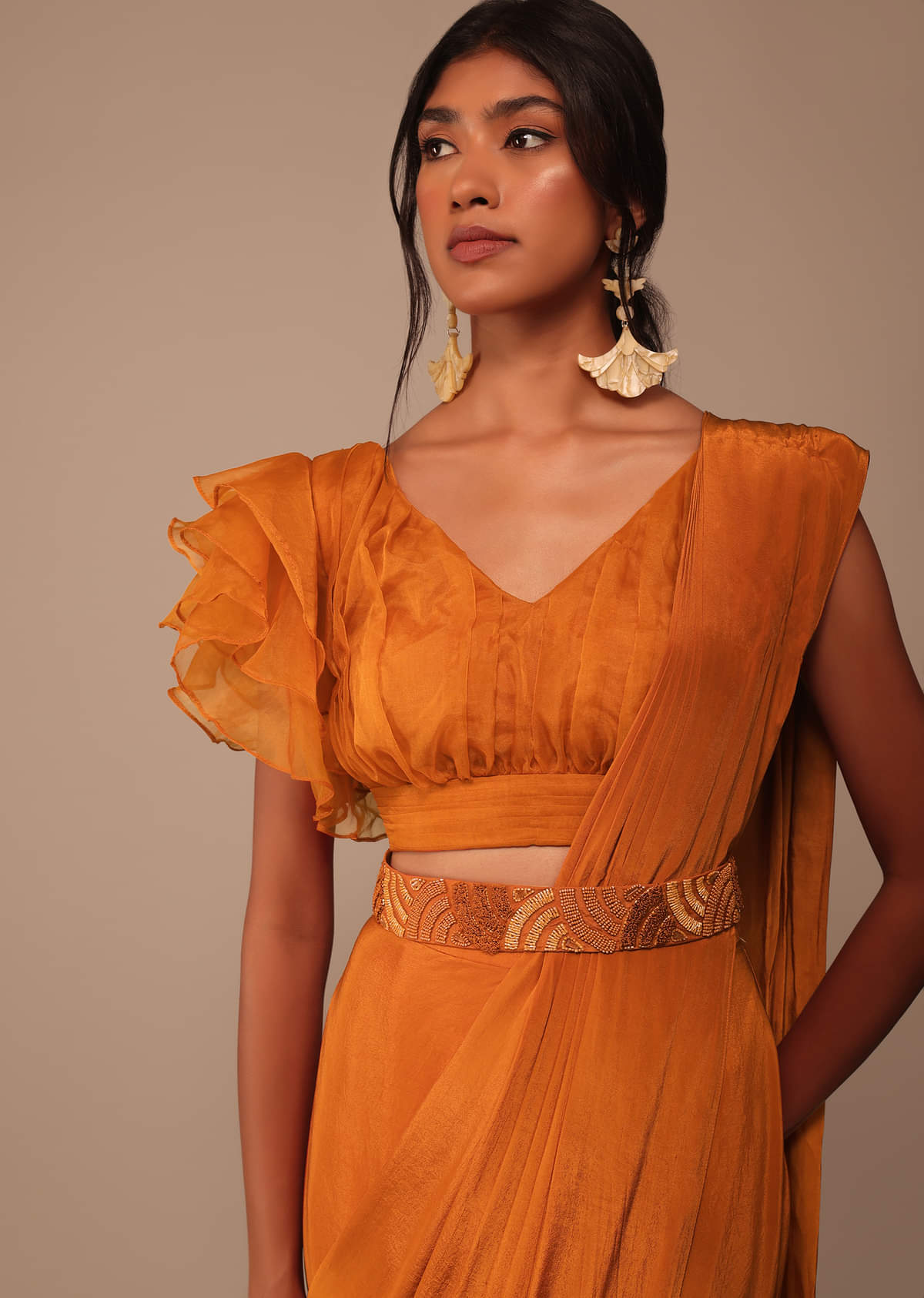 Rust Orange Pre Drape Saree With Fancy Ruffle Blouse And Embroidered Belt