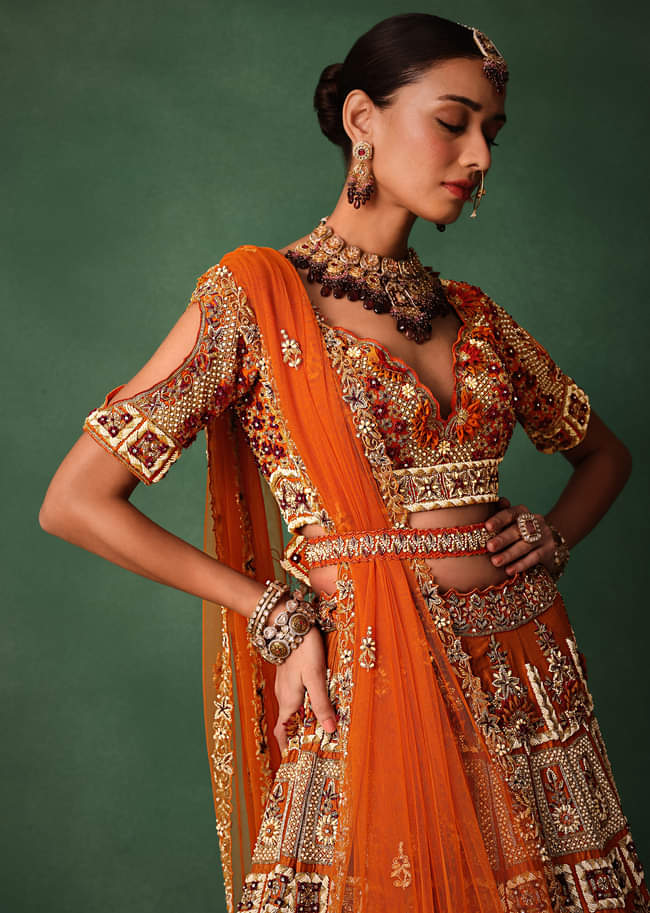 Rust Red Hand Work Bridal Lehenga With Deep Neckline Blouse And Dupatta