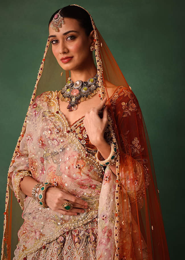 Rust V Neck Blouse With Heavy Jaal Cutdana Work Bridal Lehenga And Heavy Dupatta