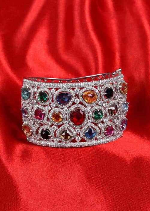 Buy Silver plated diamond studded kada adorn with navratna stones
