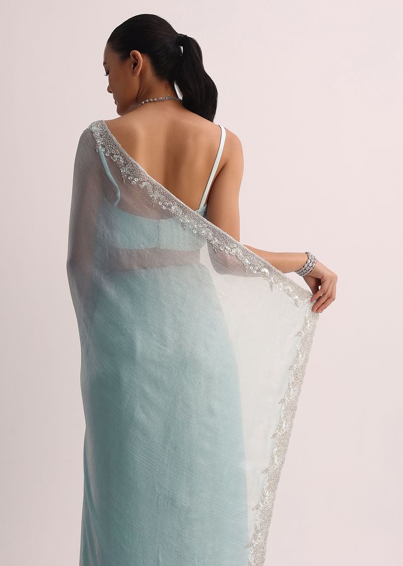 Sky Blue Saree WIth Embroidered Border And Unstitched Blouse