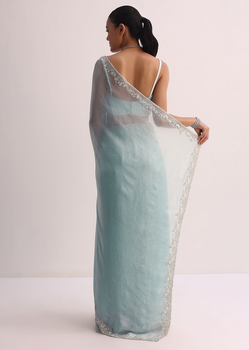Sky Blue Saree WIth Embroidered Border And Unstitched Blouse