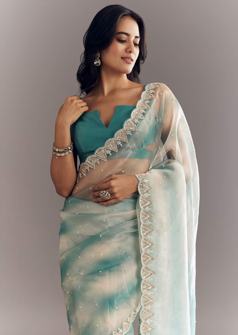 Teal Blue Shaded Organza Saree With Moti Stone Sequins Embroidery And Cutwork Scallop Border