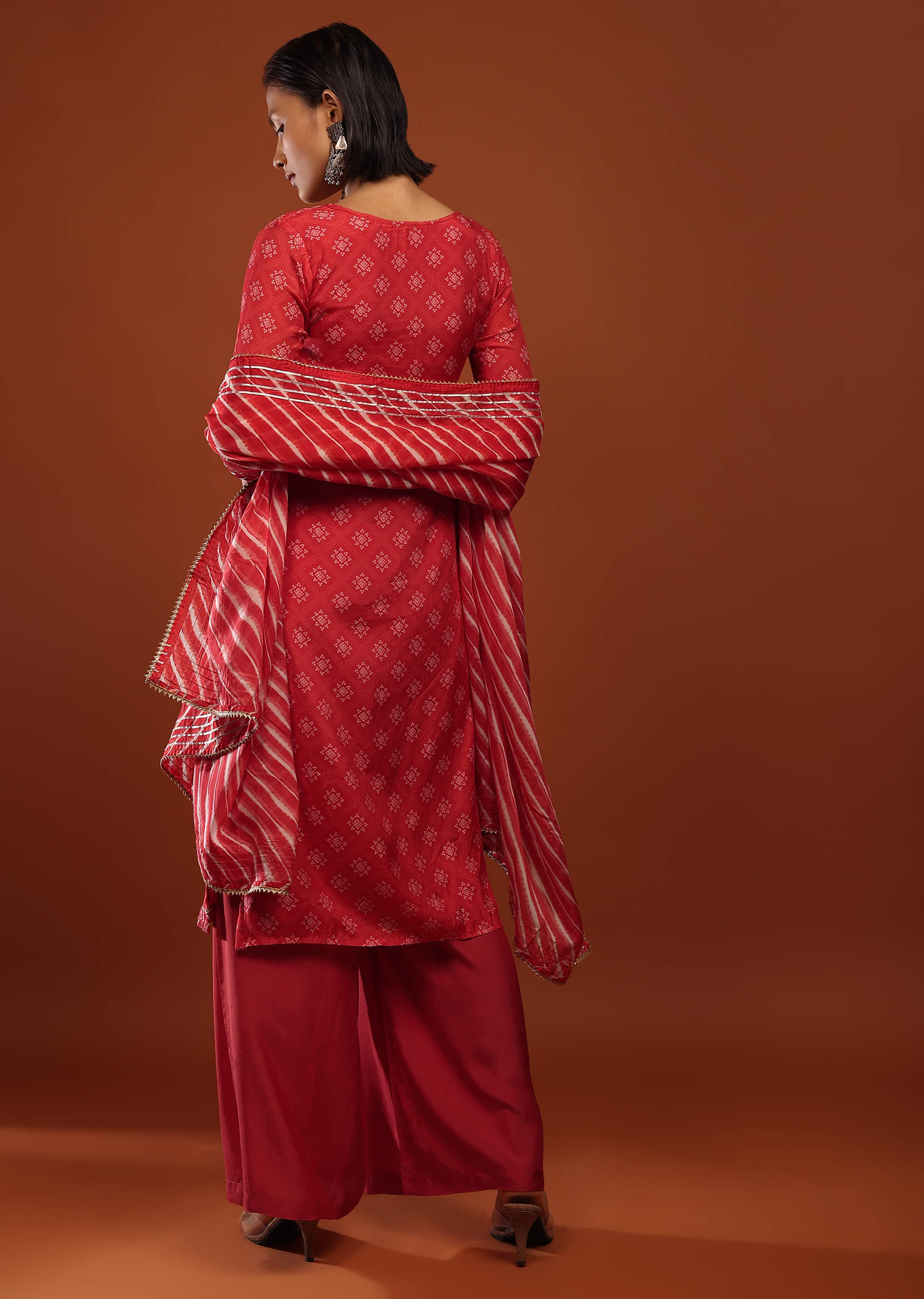 Buy Fiery Red Straight Cut Palazzo Suit With Bandhani Print And Gotta Patti Embrodiered Yoke Design KALKI Fashion Global