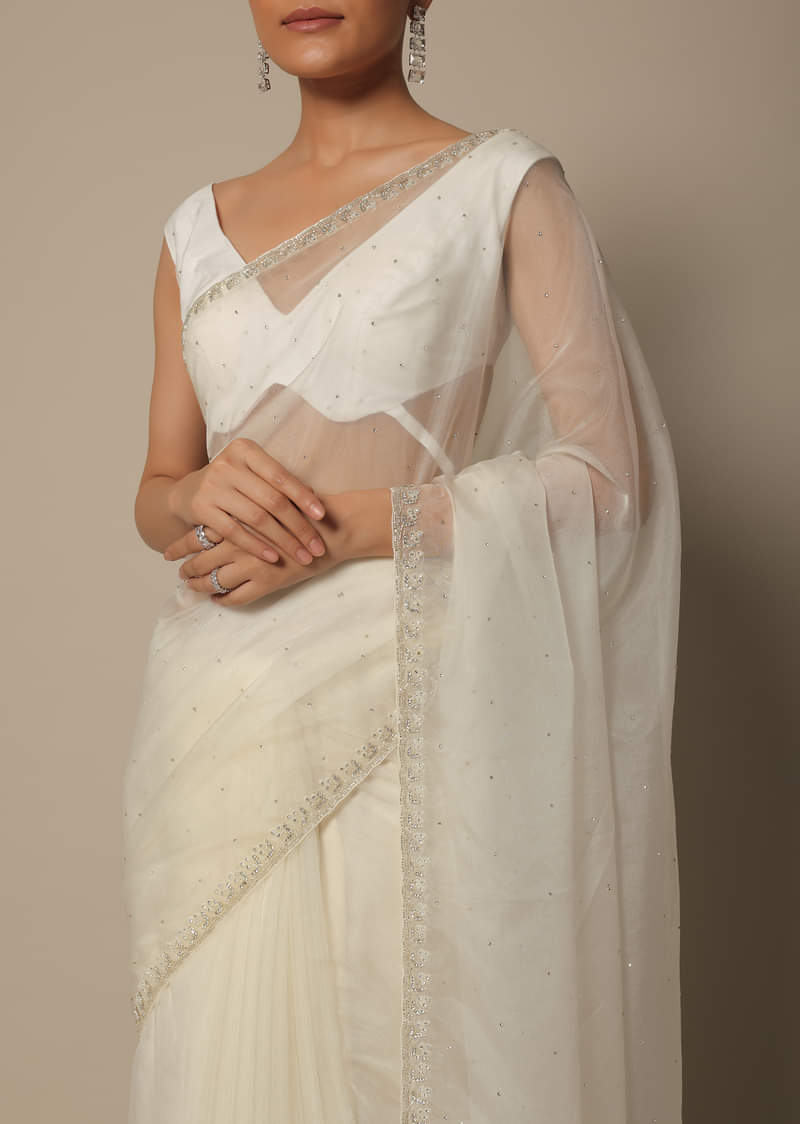 White Organza Saree With Scallop Cutdana Border And Unstitched Blouse Piece