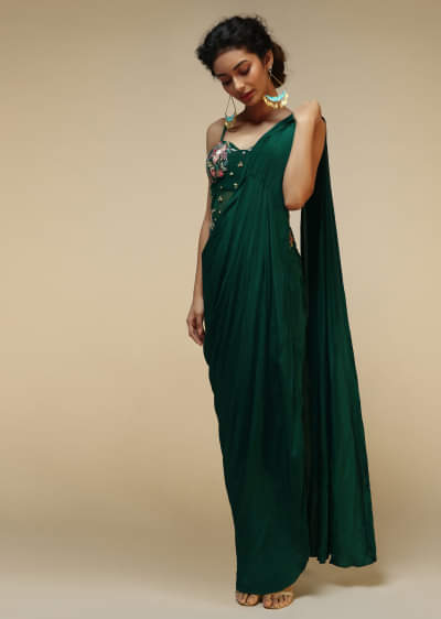 Bottle Green Saree Gown With A Crepe Cowl Drape And Sheer Embroidered Net Bodice With Colorful Resham Flowers  