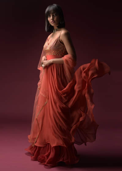 Coral Anarkali Suit With Geometric Shaped Mirror Accented Bodice And Fun Layered Hemline  