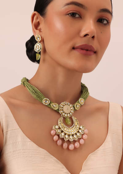 Green Kundan Pendant Necklace Set With Pink Bead Drops And Crescent Moon Motif 