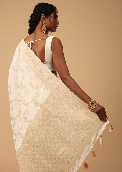 Off white and golden silk saree top