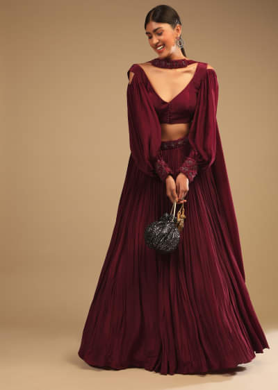 Maroon Lehenga In Crepe With Embroidery Detailing On The Waist And Bishop Sleeved Crop Top 